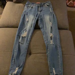 Blue ripped skinny jeans